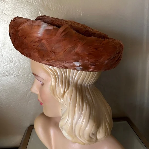 REFINED 1960s' HAT COVERED IN RUST COLORED FEATHERS